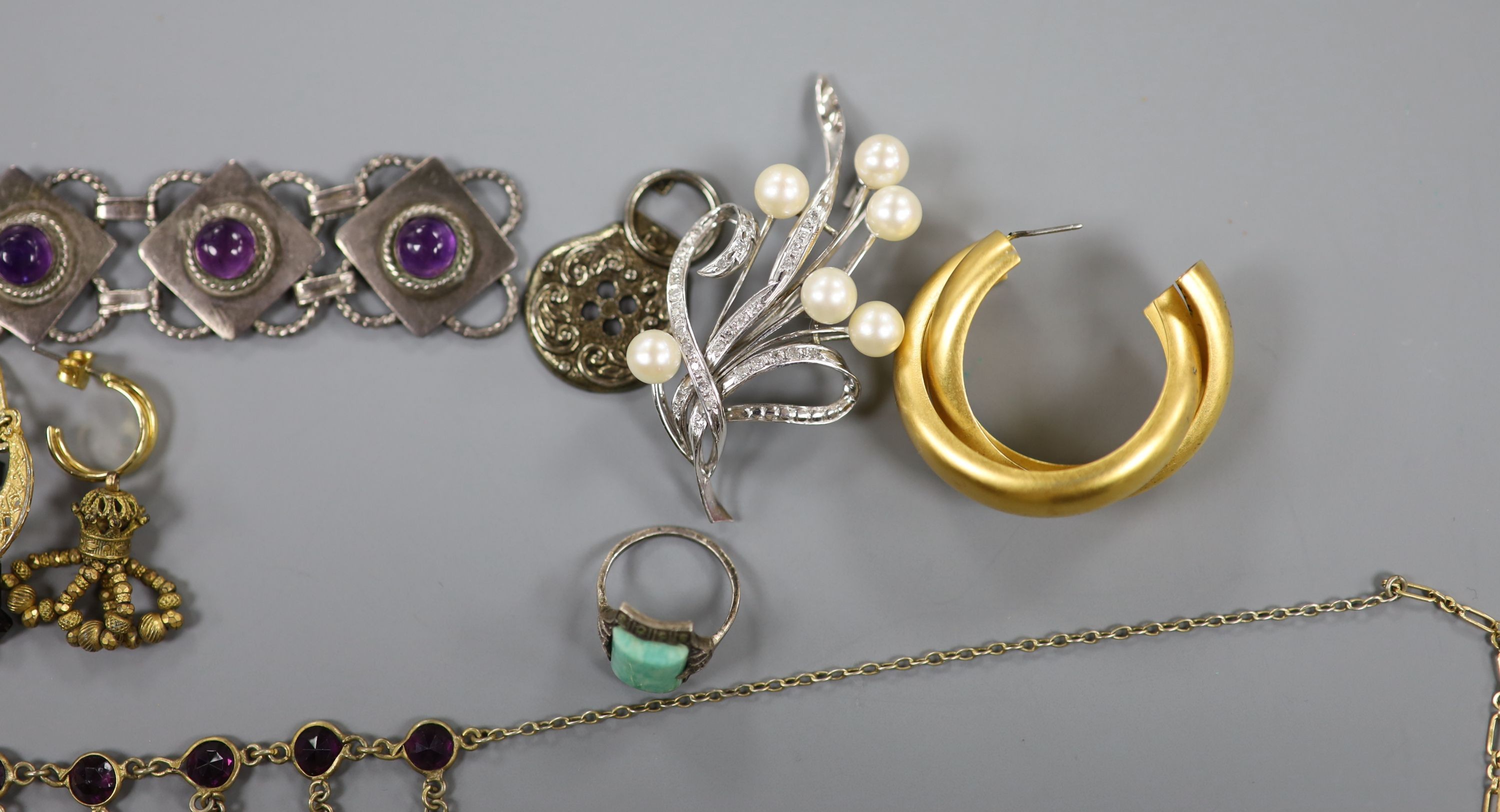 Mixed jewellery including two gilt white metal masonic ball pendants, 14k white metal, diamond and cultured pearl set floral spray brooch, 57mm, gross 11.3 grams and a cabochon amethyst set bracelet.